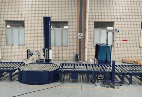 Paper-roll pallet online strapping and wrapping line