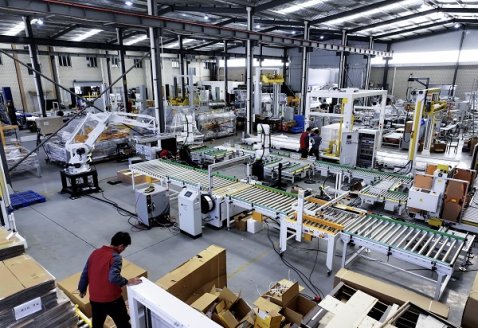 Oversized Carton Sealing, Strapping, and Palletizing Line